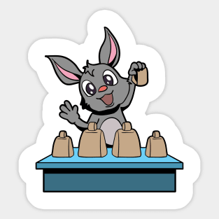 Cartoon bunny playing cowbells Sticker